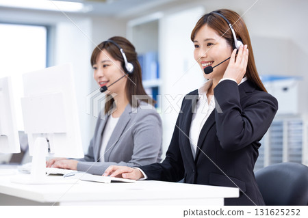 Business woman wearing an intercom 131625252
