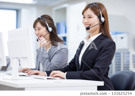 Business woman wearing an intercom 131625254