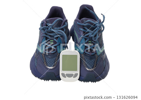 Athletic shoes with a glucose meter in front, isolated, PNG 131626094