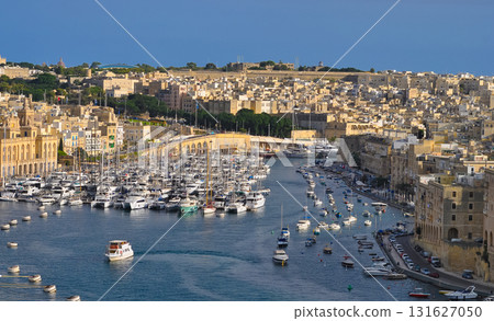 Drone view of Valletta city - little yachts and boats near Valletta in Malta Drone view of Valletta city - little yachts and boats near Valletta in Malta 131627050