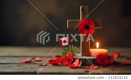 A wooden cross and red poppy flowers on a table, symbolizing patriotism and remembrance for those who served 131628142
