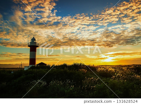 Lighthouse dyed in the sunset 131628524