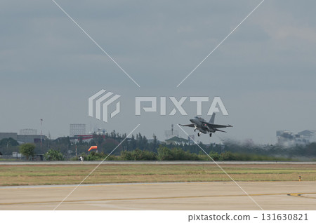 Supersonic fighter jet moving in airport on technology background 131630821
