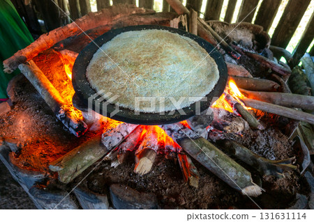 Cooking Cassava Cake in Siona Village, Cuyabeno, amazonia, Ecuador 131631114