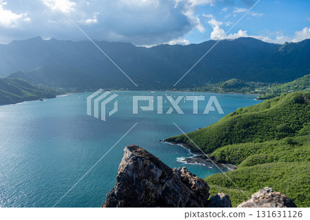 Taiohae Bay and town with anchored sailboats in Nuku Hiva, Marquesas Islands, French Polynesia Taiohae Bay and town with anchored sailboats in Nuku Hiva, Marquesas Islands, French Polynesia 131631126