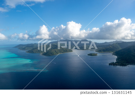 Aerial view of Tahaa island, French Polynesia, with turquoise lagoon and reef 131631145