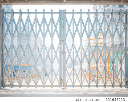 Accordion gate at a construction site 131632233