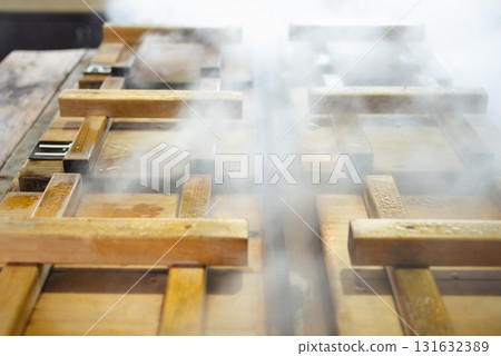 A row of hot spring steaming pots A row of hot spring steaming pots 131632389