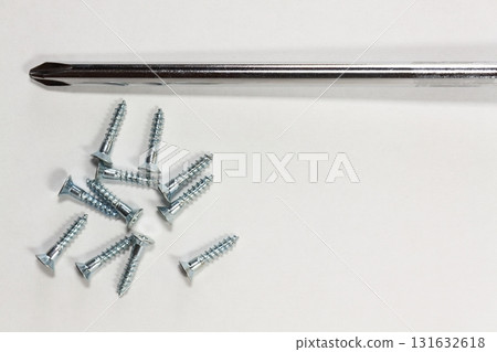 screwdriver and wood screw 131632618