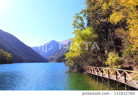 Picturesque autumn scenery of Kolsai lake, northern region of Tien Shan Mountains, Kazakhstan. Enchanting lake landscape. Alpine Kolsai lake, Almaty region, Kazakhstan. Topic of vacation, travel, tour 131632760