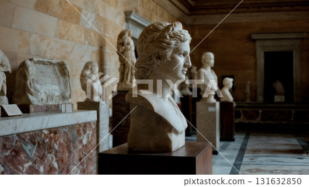 A group of statues in a museum 131632850