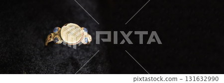 gold ring old woman black background copy space banner. blue stone jewellery legacy ad. black background jewellery copy space gold ring old woman black background copy space banner. blue stone jewellery legacy ad. black background jewellery copy space 131632990