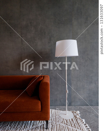 room with red sofa and white floor lamp room with red sofa and white floor lamp 131633097