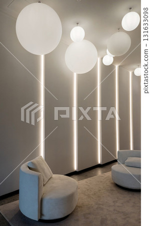Soft chair in minimalist room Soft chair in minimalist room 131633098