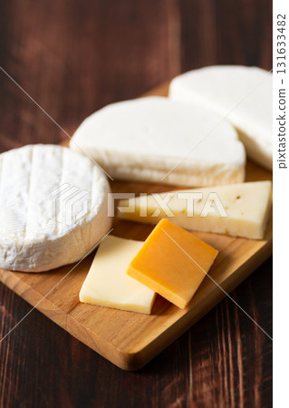 A collection of various cheeses 131633482