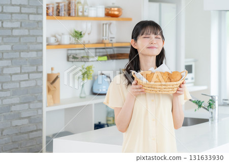 Middle-aged woman making bread in the kitchen 131633930