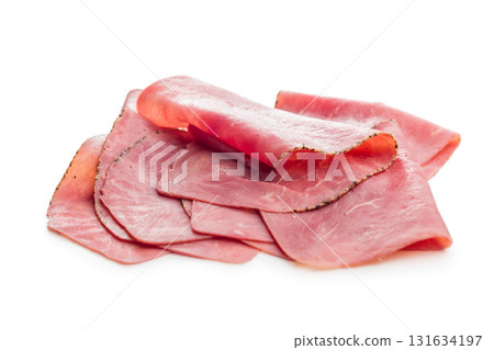 Sliced beef pastrami isolated on white background. 131634197