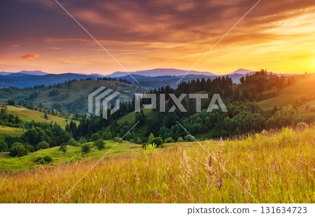 Summer sunset in mountains 131634723