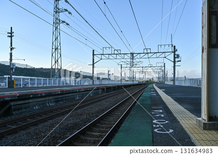 Image of train tracks at a station 131634983