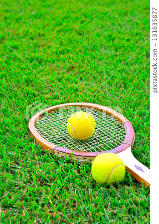 tennis ball on tennis racket tennis ball on tennis racket 131635877