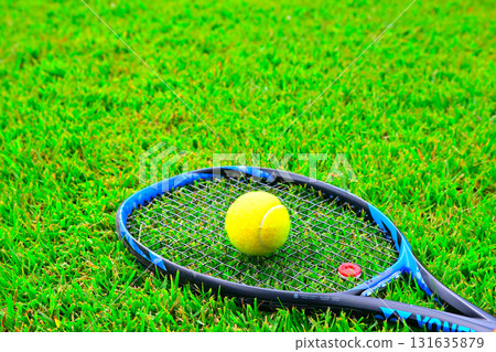 Landscape with tennis racket and ball 131635879