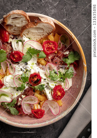 Colorful vegetable salad with radish and tomatoes Colorful vegetable salad with radish and tomatoes 131635898