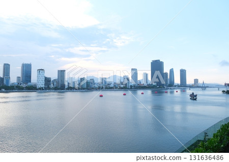 Dragon Bridge in Da Nang Vietnam steel dragon architecture over Han River with LED lights sky reflection and scenic coastal river view Dragon Bridge in Da Nang Vietnam steel dragon architecture over Han River with LED lights sky reflection and scenic coastal river view 131636486