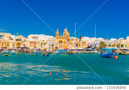 Cityscape of Marsaxlokk, a small traditional fishing village in Malta Cityscape of Marsaxlokk, a small traditional fishing village in Malta 131636848