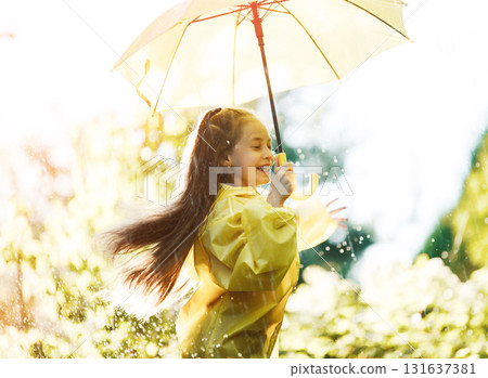 girl with an umbrella girl with an umbrella 131637381