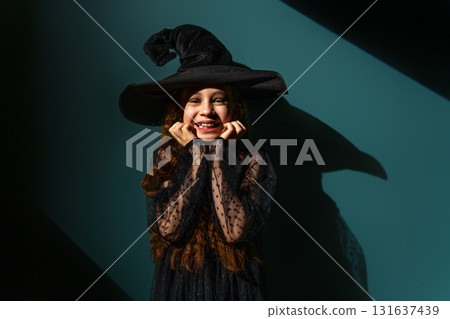 Girl is celebrating Halloween 131637439