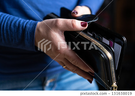 Woman hands wallet purse women money credit cards 131638019