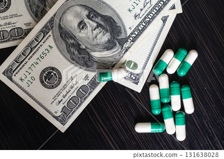 Money and pills, health pill tablet cash dollar capsule pharmaceutical 131638028