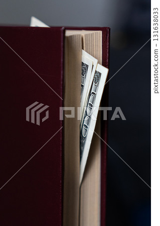 Money Hidden in a Book Safe dollar cash savings 131638033