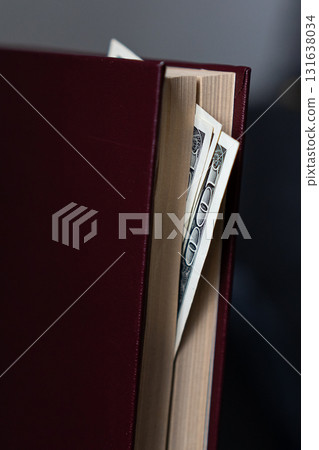 Money Hidden in a Book Safe dollar cash savings 131638034
