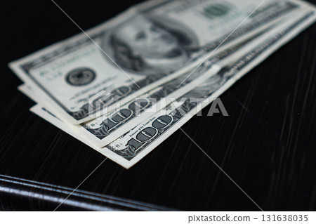 Money dollar closeup earnings savings cash wealth Money dollar closeup earnings savings cash wealth 131638035