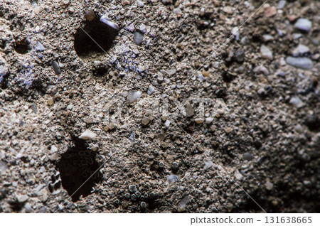 A close-up of a stone shows its relief 131638665