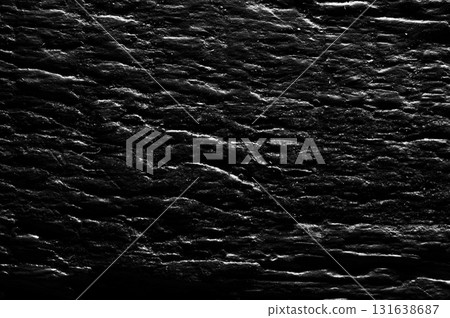 The dark wood texture conveys a sense of antiquity and sophistication 131638687