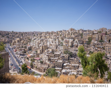 [Jordan] A streetscape of densely packed stone houses seen from Amman Citadel in downtown Amman, the capital 131640411
