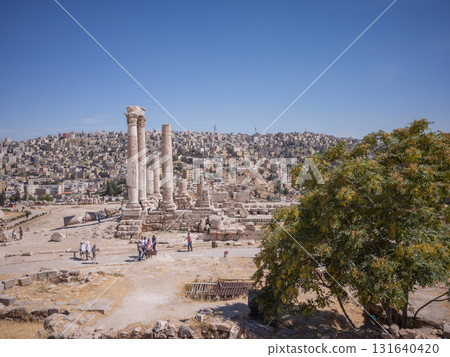 [Jordan] A distant view of the ruins and stone streets of the Amman Citadel in downtown Amman, the capital of Jordan 131640420
