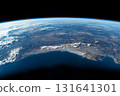 View of Earth from space captured during low-light conditions showcasing urban lights and natural atmosphere 131641301