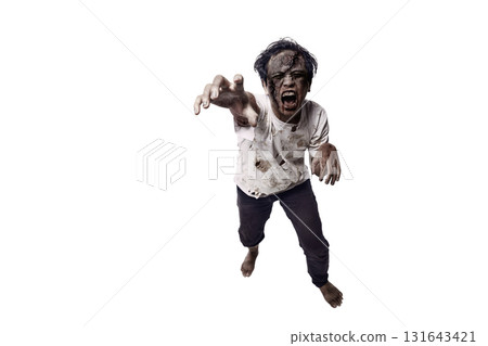 Portrait of an Indonesian southeast asian scary male zombie with a wound and blood on the body isolated over a white background. Spooky expression. Concept of Halloween or Horror 131643421