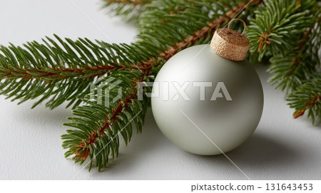 Christmas tree ornament hanging on pine branch Christmas tree ornament hanging on pine branch 131643453
