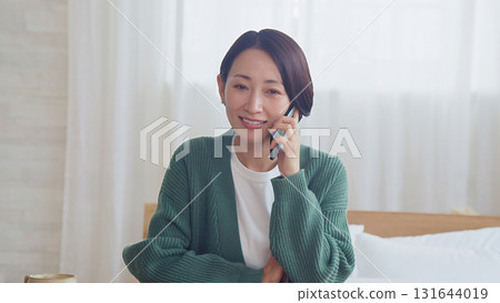 Woman doing phone call Woman doing phone call 131644019