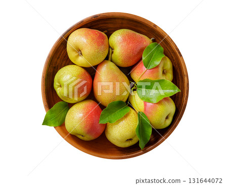 bowl of fresh ripe pears with leaves isolated on white background 131644072