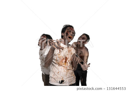 Portrait of three Indonesian southeast asian scary male zombies with wounds and blood on their bodies isolated over a white background. Spooky expression. Concept of Halloween or Horror 131644553