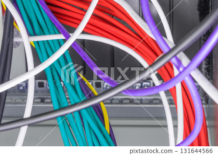 large group of UTP cables, Ethernet cables in rack cabinet, lead 131644566
