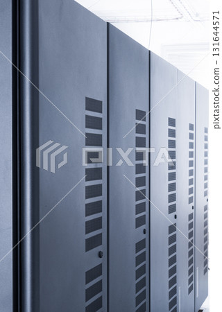 server cabinets inside data center room server cabinets inside data center room 131644571