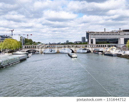 Wide view from Passerelle Simone-de-Beauvoir towards Pont de Bercy in Paris Wide view from Passerelle Simone-de-Beauvoir towards Pont de Bercy in Paris 131644712