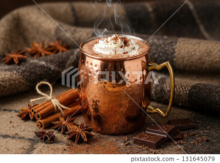 Cozy Winter Hot Chocolate in a Polished Copper Mug with Whipped Cream and Spices 131645079