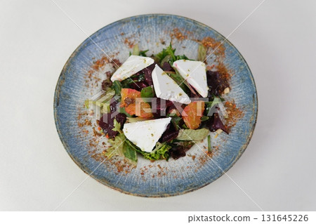 Greek salad on dark background. top view. Healthy food. 131645226